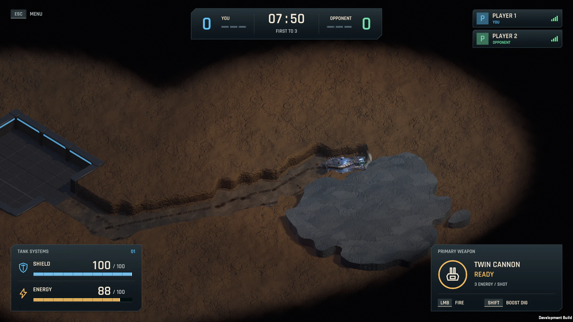A blue tank carves a winding route around solid bedrock, with its base visible behind it.